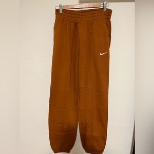 Nike Rust Orange sweatpants in size Small